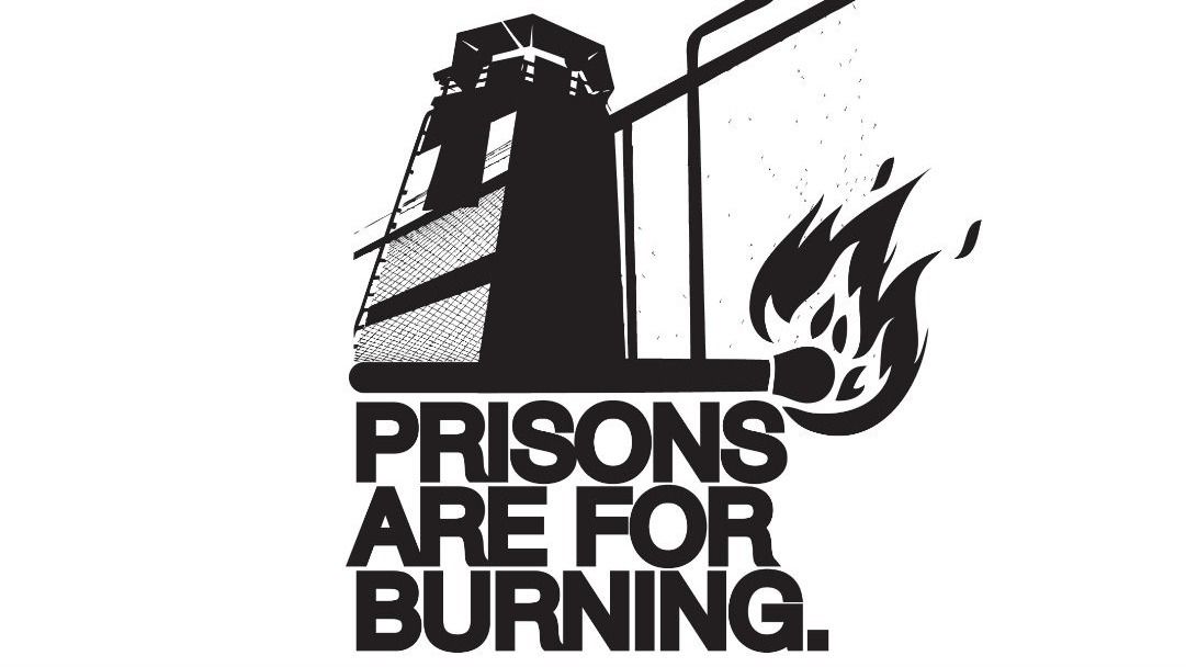 text "prisons are for burning" with a lit match under a guard tower